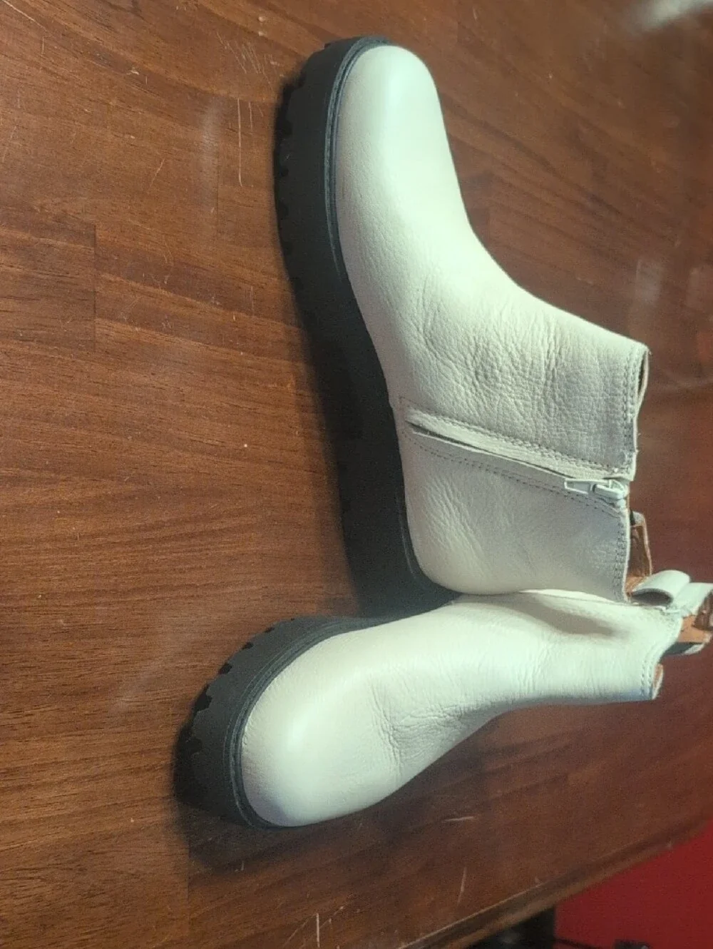 Zodiac White Leather Ankle Booties with Black Lug Sole